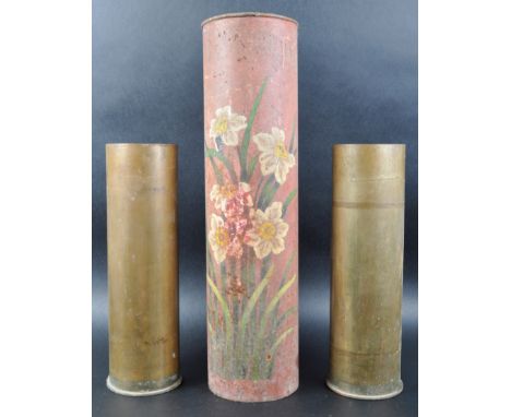 A selection of vintage 20th Century artillery shells two having polished brass cases with marks to the bases. Together with a
