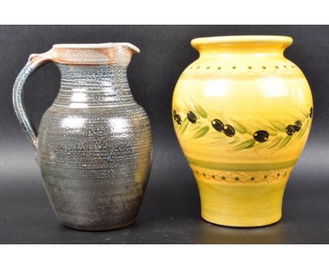 Two retro vintage 20th Century studio art pottery comprising a yellow glazed vase of globular form with olive decoration. Tog