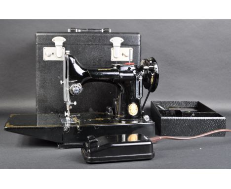 Singer Sewing Machine - Featherweight Model Number 221k - A vintage 20th Century cased portable sewing machine. Appears compl