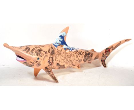 A large contemporary formed fiberglass model / wall art of a Hammerhead Shark fully graffitied by members of Icon Film Studio