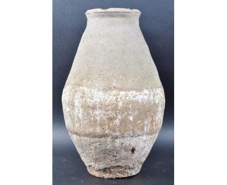 Julfar Ware (U.A.E., Ras Al-Khaimah) - A large earthenware pottery vase of&nbsp;baluster form having a lipped rim and taperin