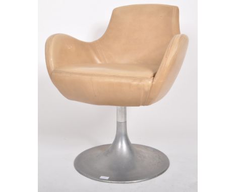 Style Matters - A retro 20th Century designer swivel armchair / office chair having a curved back and armrests with light tan