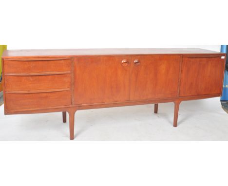 A. H. Mcintosh &amp; Co - A retro vintage 20th Century stained teak sideboard credenza having a bank of three drawers to the 