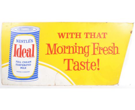 Nestle's - A retro vintage mid 20th Century point of sale / shop advertising hardboard sign for Nestle's Ideal Full Cream Eva