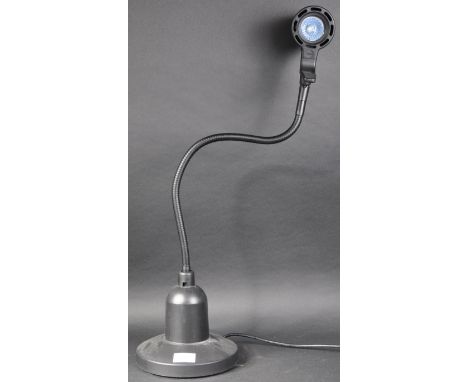Ask Serious Readers - A&nbsp;contemporary adjustable desk / table reading lamp light&nbsp;having adjustable light top upon a 