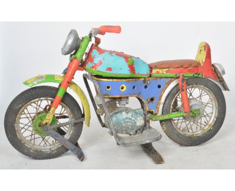 Minimotor - A vintage mid 20th Century juvenile fairground / funfair carousel ride in the form motorbike / Harley Davidson Ch
