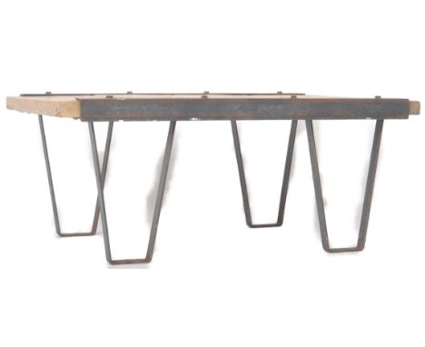 A contemporary handmade coffee table / low table of simple rectangular form having an oak plank top with iron bound sides. Ra