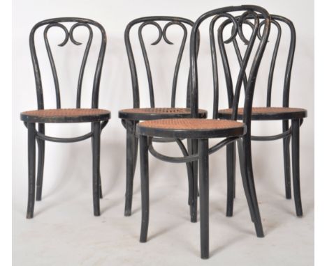 A matching set of four vintage early 20th Century&nbsp;Thonet style café bistro dining chairs of ebonised bentwood constructi