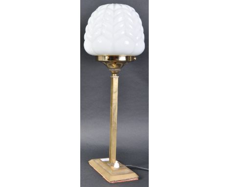 A vintage 20th Century Art Deco brass table lamp light having a&nbsp;opaline ribbed glass shade raised on a straight brass st