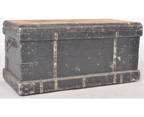 A 19th Century Victorian ebonised pine and ironbound tool chest / coffee table box having a lift up lid opening to reveal an 