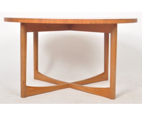 AH McIntosh &amp; Co of Kirkaldy - Starburst - A retro mid 20th Century designer teak coffee table of circular form having a 