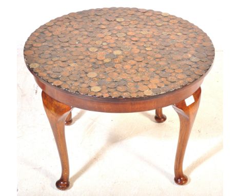 Coin Top Table - A 20th Century Queen Anne revival walnut coffee / low table of circular form having a lacquered top set with