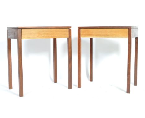 A matching pair of retro 20th Century teak wood side tables / lamp occasional tables. Each having blind fronted single drawer