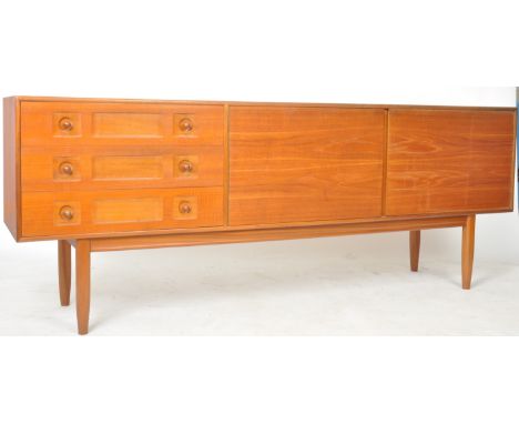 A. H. Mcintosh &amp; Co - A retro vintage 20th Century designer teak sideboard credenza having a bank of three drawers to the