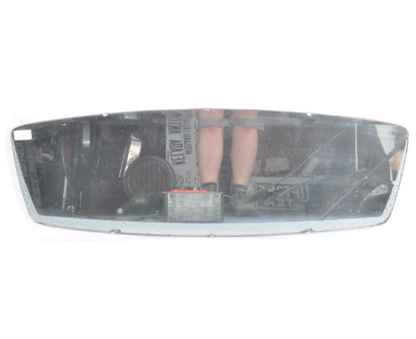 A retro mid 20th Century 1960s hanging mirror of curved rectangular form having frosted glass decoration to the boarders. Mou