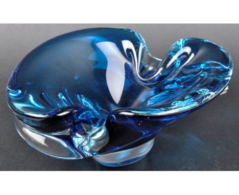 A retro vintage 20th Century Italian Murano Sommerso studio art glass bowl of organic freeform design in dark blue. Measures 