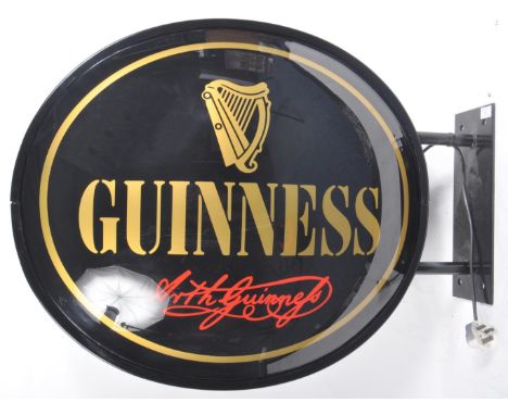Guinness - A large 20th Century advertising point of sale pub display double sided light box sign for Guinness. Gold and red 
