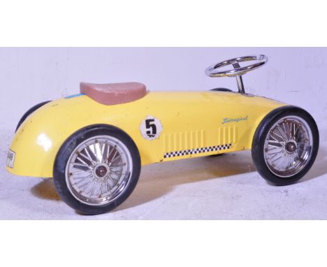 A retro 20th Century Spanish&nbsp;tinplate car in the style of a racing car finished in vibrant yellow with rubber wheels. Me