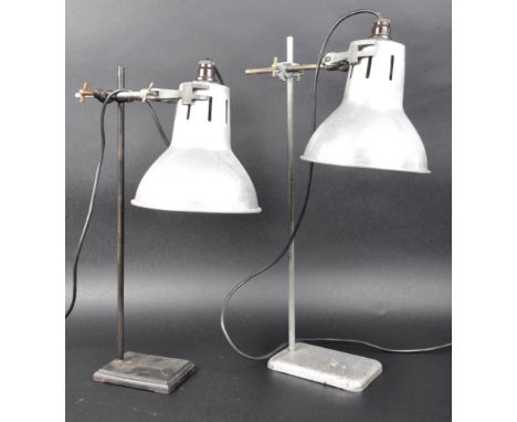 A pair of retro 20th Century&nbsp;industrial / scientific work lamp lights with each having polished aluminum pendant shades 