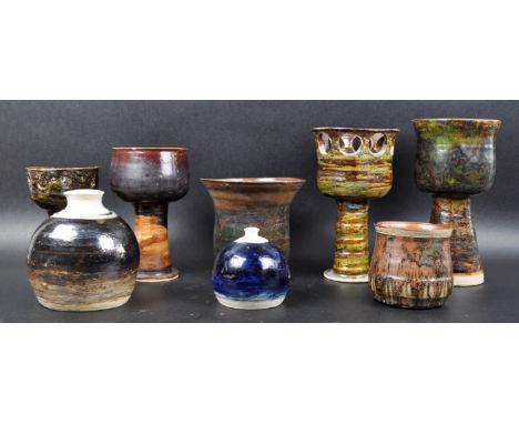 A selection of retro 1960s / 70s studio art pottery with multiple vases, planters / plant pots etc. All most with light dark 