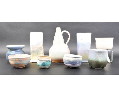 A selection of retro 1960s / 70s studio art pottery with multiple vases, planter, jugs ect. All most with light blue tones. A
