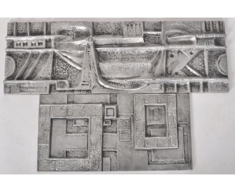 Two retro 20th Century 1970s formed fiberglass abstract / brutalist art panels with each having geometric patterns with a ste