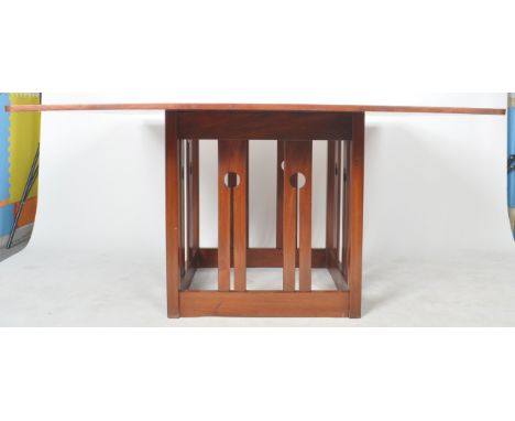 Charles Rennie Mackintosh (manner of) - A vintage 20th Century Art &amp; Craft solid teak dining table having a large square 