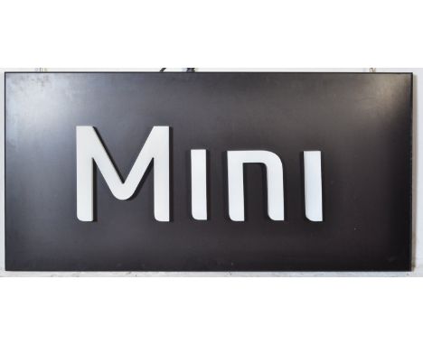 Mini - A contemporary motoring point of sale showroom advertising light sign having a black&nbsp;finished mounting backplate 