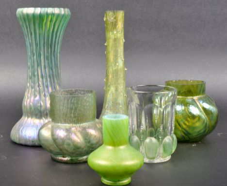 A selection of Art Nouveau green pearlescent / luster glass vases with some of bud form with textured glass finish. One clear