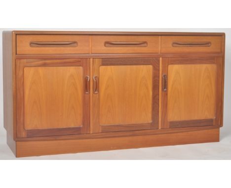 G Plan - Fresco - Victor B Wilkins - A retro mid 20th Century circa 1960s teak wood sideboard credenza having a run of three 