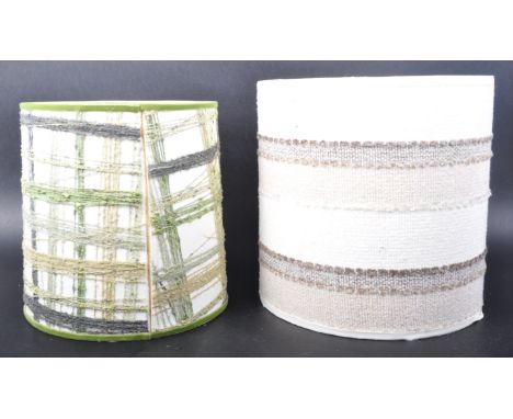 Two retro mid 20th Century 1960s table / ceiling light shades of drum form with one having green spun wool decoration. Bigges