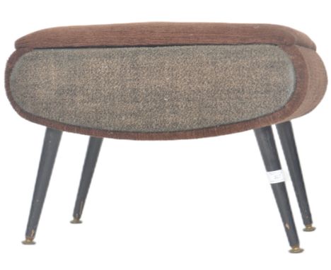 A retro vintage 20th Century 1970s sewing work box stool having a brown fabric cover with hinged lid opening to reveal a vibr