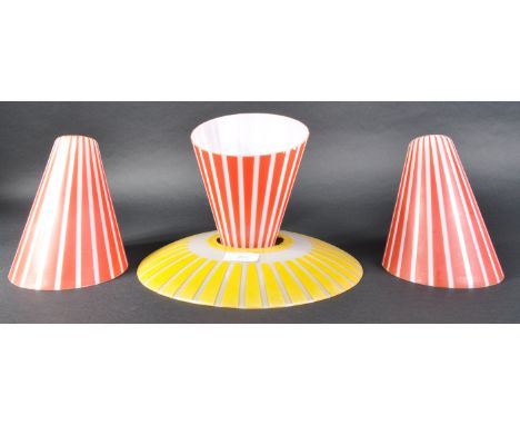 A selection of retro mid 20th Century coloured glass shades comprising a group of three red and white striped conical example