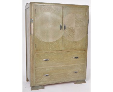 A vintage 20th Century Art Deco stained oak tallboy / linen press cupboard having a double door cupboard top with shelved int