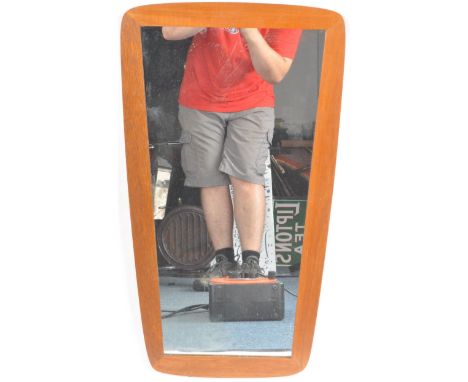 A retro mid 20th Century Danish teak framed symmetric mirror of tapering form. Marked Denmark to the verso. Measures approx; 