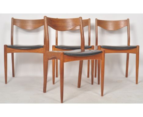 SL Møbler Durup - A matching set of four mid Century Danish teak wood dining chairs having curved backrests with faux black l