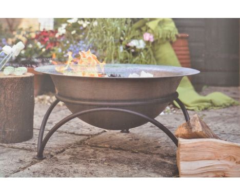 Woodlodge - A boxed and brand new cast iron fire pit on stand. Circular in form raised on curved legs. Measures approx; 63cm 
