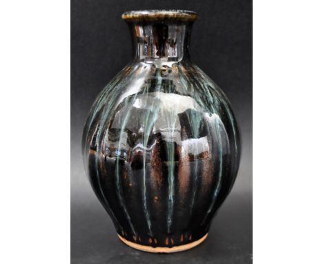 Simon Eeles - Shepherd's Well pottery - A retro 20th Century studio art pottery stoneware vase having a polo neck with bulbou