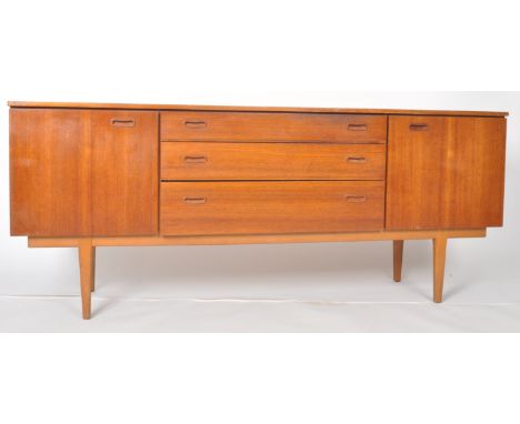 Nathan - A retro vintage 20th Century teak wood sideboard credenza having a central bank of three graduating drawers flanked 