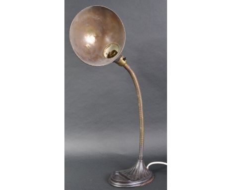 A vintage early 20th Century Art Deco articulated brass gooseneck table / desk lamp light having a brass cup shaped shade sup