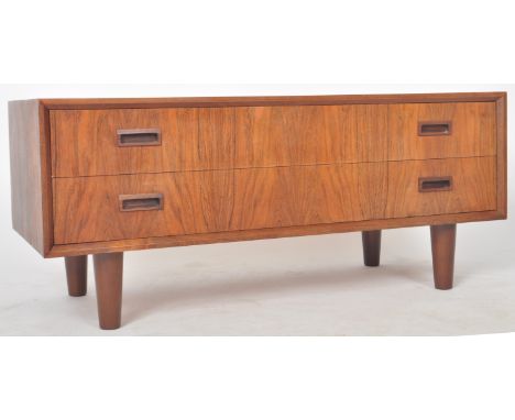 A retro mid Century afromosia teak wood low chest / media / Hi-Fi unit of simple rectangular form having two full length draw