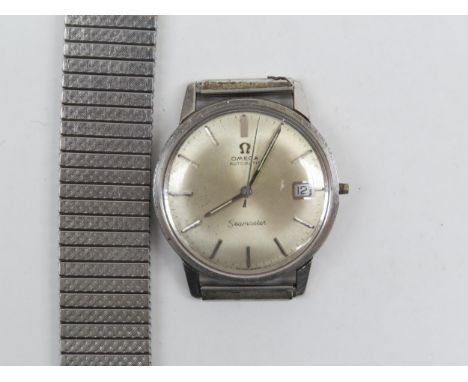 An Omega Automatic Seamaster wristwatch with baton markers and date aperture, no crown to winder, strap detached