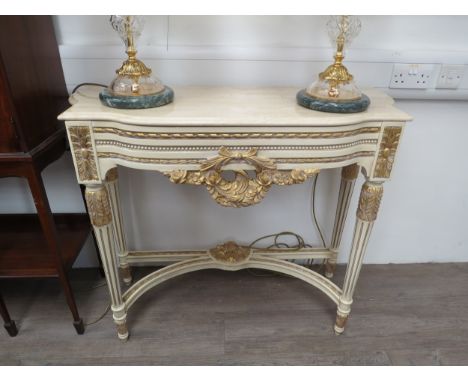A modern Continental marble top pier/console table with gilt garland detail, reeded legs, 87cm x 104cm x 41cm