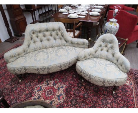 A Victorian parlour/conversation sofa with serpentine front, scrolled button back and outswept arms and a matching chair, uph