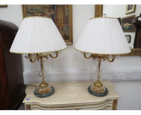 A pair of late 20th/early 21st Century Italian ceiling lamps with glass and ormolu stems to grey marble bases, Continental wi