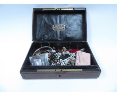 A box of bijouterie to include a Scottish hard stone brooch, French weather-cased fob watch, opal stick pin, hard stone seals