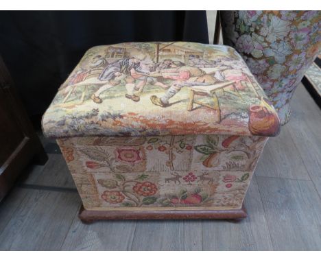 A Victorian tapestry covered stool/box, 40cm x 50cm x 42cm