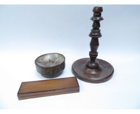 A large treen candlestick, rustic dish and pencil box (3)