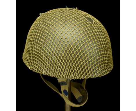 A Korean War period Airborne Paratroopers steel helmet. A Korean War period Airborne Paratroopers steel helmet, green painted
