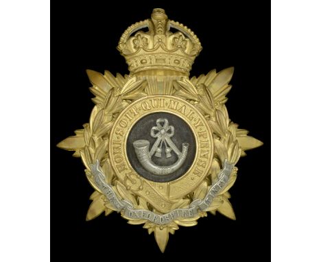 The Oxfordshire Light Infantry Officer’s Helmet Plate 1902-08.â€¨A scarce example, the gilt crowned star back plate with laur